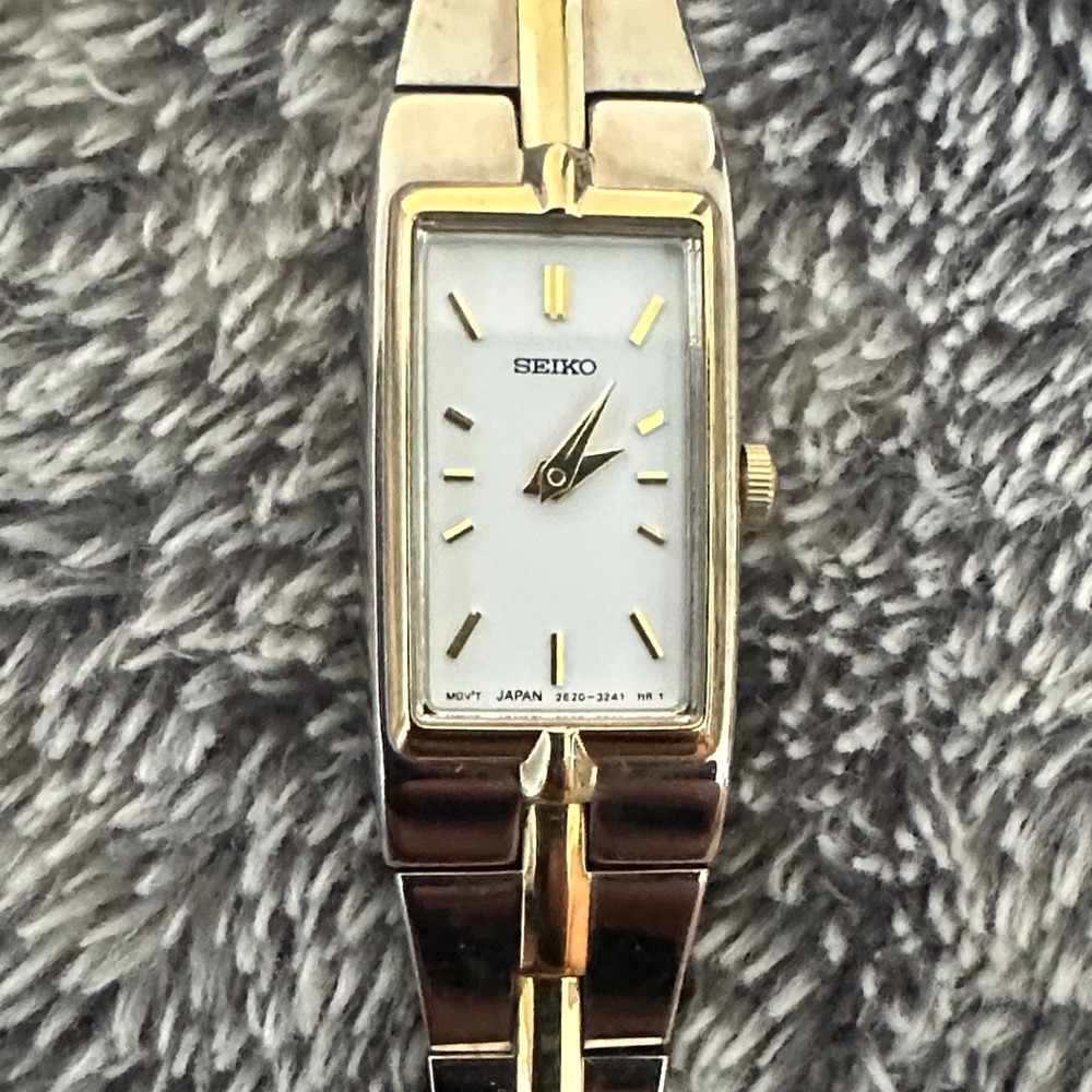 Seiko Women's Gold and White Watch